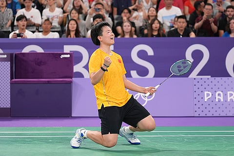 China's He Bingjiao celebrates after defeating PV Sindhu 